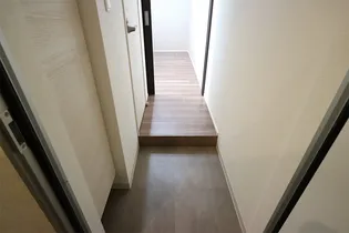 DomaniI【1階】の玄関