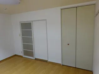 コートヴィラージュ【1階】の居間