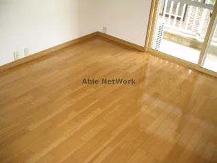 パークタウンハウスI【2階】の居間