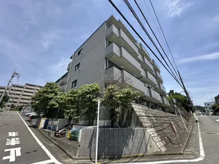 東京都多摩市馬引沢2【マンション】の外観