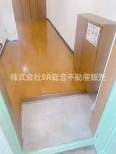 朋成マンション【3階】の玄関