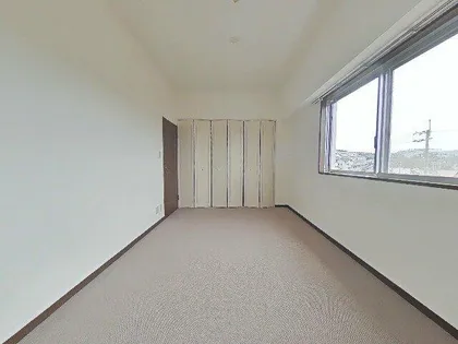 スコーレ川西畦野駅前【3階】の居間