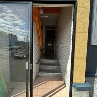 コスモXI【201号室】の玄関