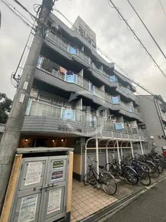 ロータリーマンション上新庄【4階】の外観