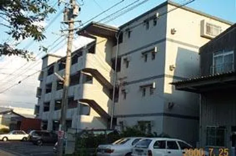 長門石山崎コーポ【4階】の外観