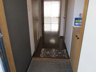 サンライズカワサキ【A303号室】の玄関