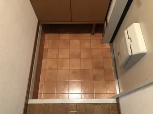 フラッツネオシティー【104号室】の玄関