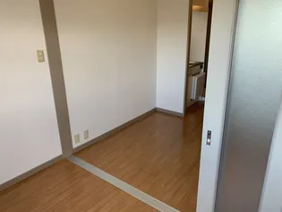 プリモローザM【3階】の居間