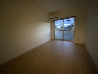 ロイヤルヒルズ北平野【4階】の寝室