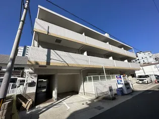 ホワイト塚本【3階】の外観
