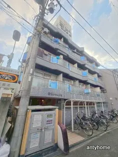 ロータリーマンション上新庄【3階】の外観