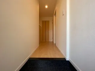 パーシモンK【1階】の玄関