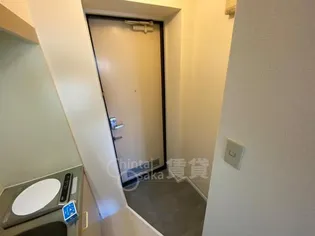 ルミエール箕面3【1階】の玄関