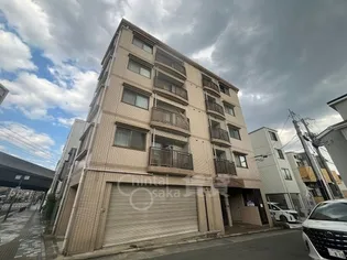 光陽川西マンション【3階】の外観