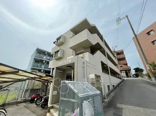 コリーヌ千里【3階】の外観