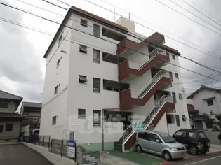 ニューマンション丸由【3階】の外観