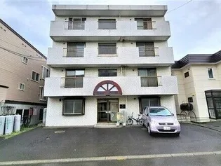 ビッグバーンズマンション南郷【202号室】の外観