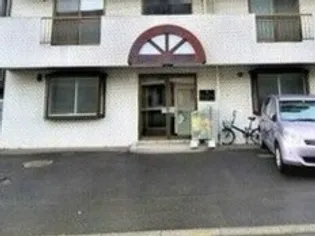 ビッグバーンズマンション南郷【202号室】の玄関