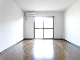 マンションHINO【3階】の居間