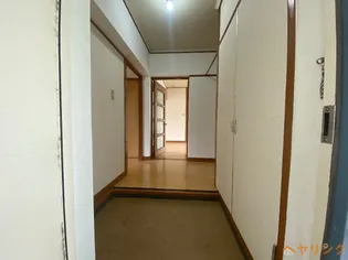 藤の木団地8棟【404号室】の玄関