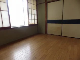 八まきビル【3B号室】の寝室