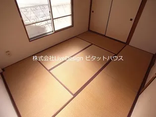 ニュー諏訪山マンション【1階】の寝室