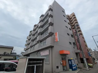 東一万ビル【202号室】の外観