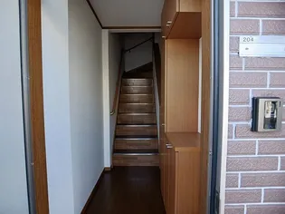 ニューフォンテーヌ【2階】の玄関