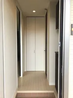 アルコイリース【1階】の玄関