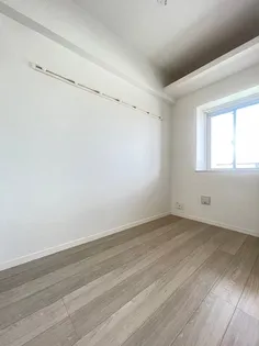 エンクレスト空港通り【8階】の寝室