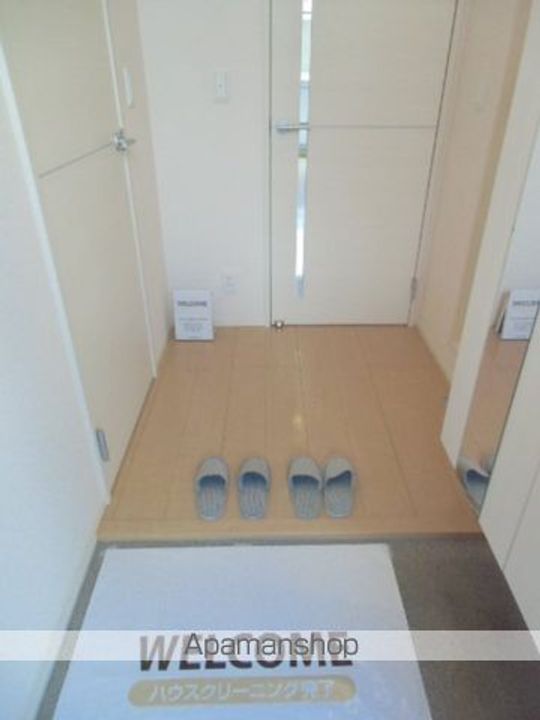 メルベーユおおたかの森 1号棟の玄関
