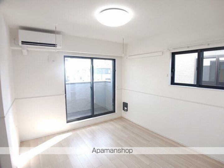 茨城県土浦市荒川沖西1丁目の賃貸アパートの居間