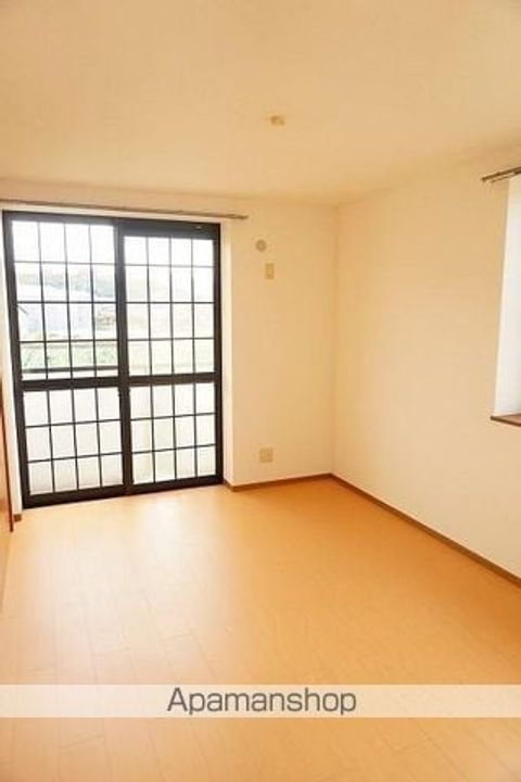 香川県高松市国分寺町福家の賃貸アパートの居間