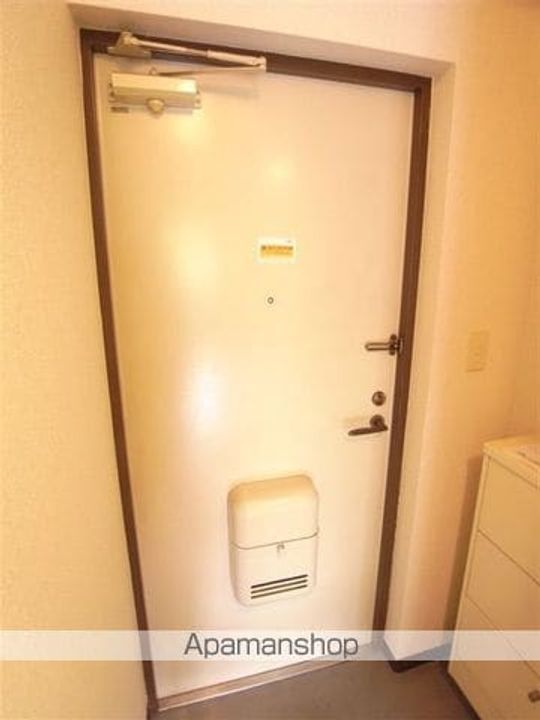 Uトピア高幡不動の玄関