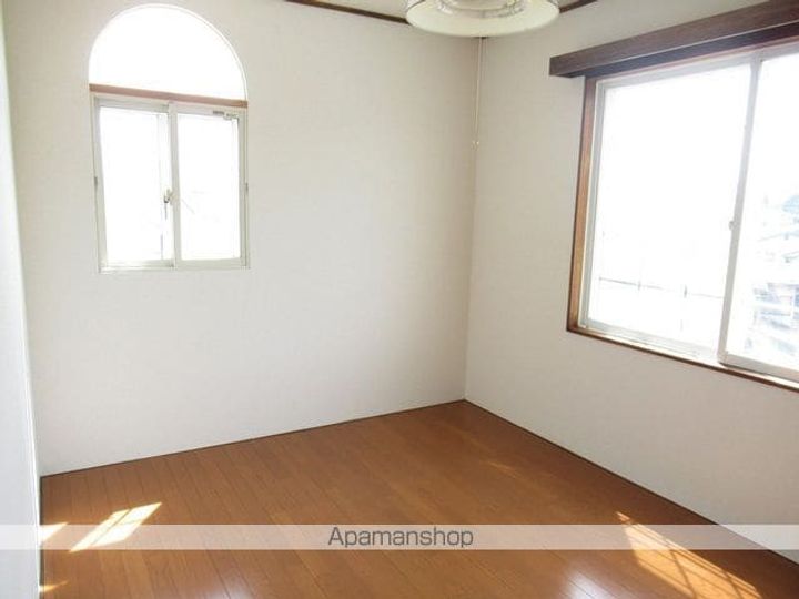 岩手県盛岡市高松1丁目の賃貸アパートの居間