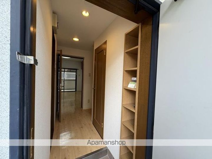 ベルメゾン松福102の玄関