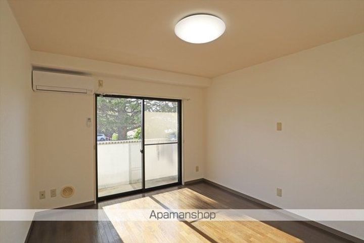 福島県郡山市開成3丁目の賃貸マンションの居間