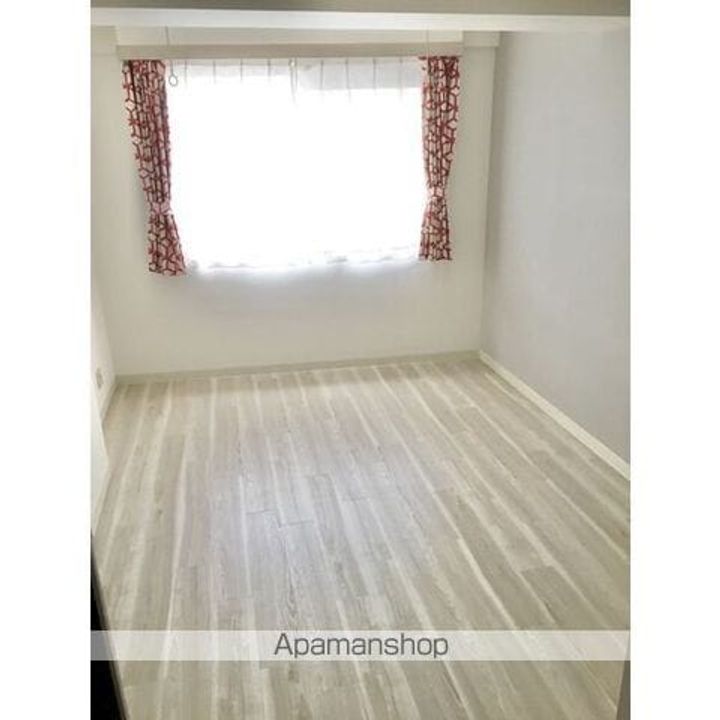 メゾン村上203の居間