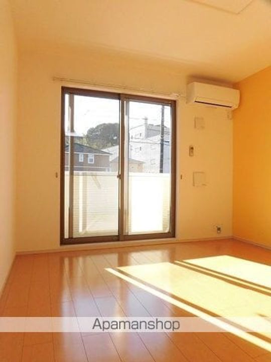 グラスコート Wの居間