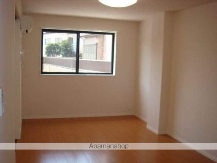 東京都あきる野市野辺の賃貸マンションの居間