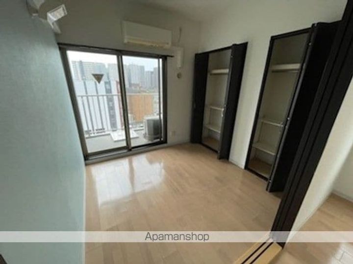 滋賀県草津市野路町の賃貸マンション405の居間