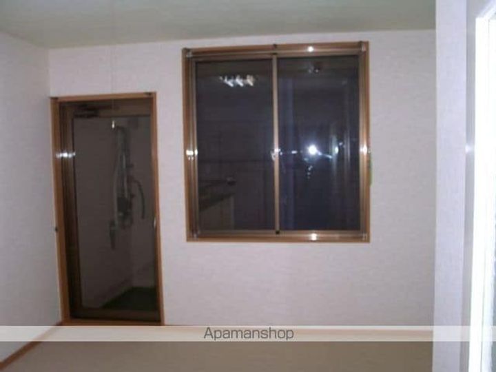 サンモール天王崎405の居間