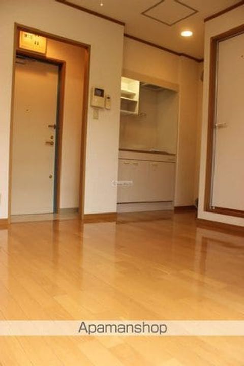 広島県尾道市三軒家町の賃貸マンションの居間