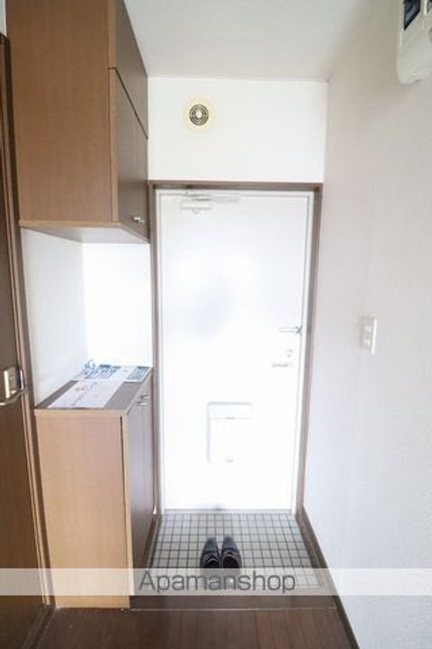 福島県郡山市長者2丁目の賃貸マンションの玄関