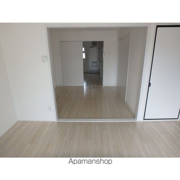 千葉県柏市東3丁目の賃貸マンションの居間