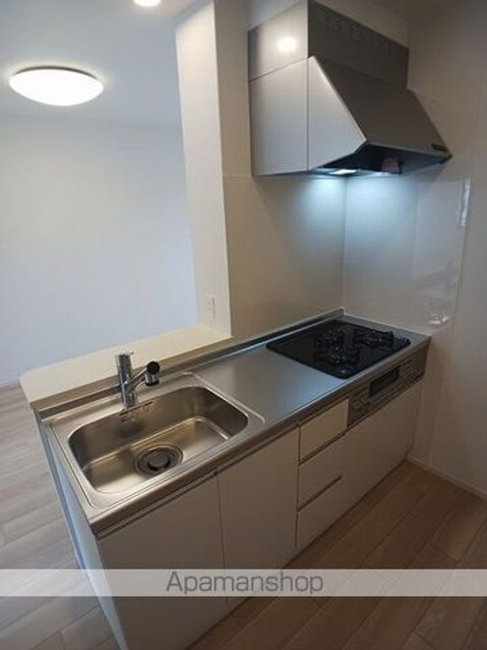 ウェル アイランドKーⅢのキッチン