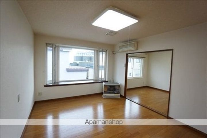 6条ハイツ202の居間