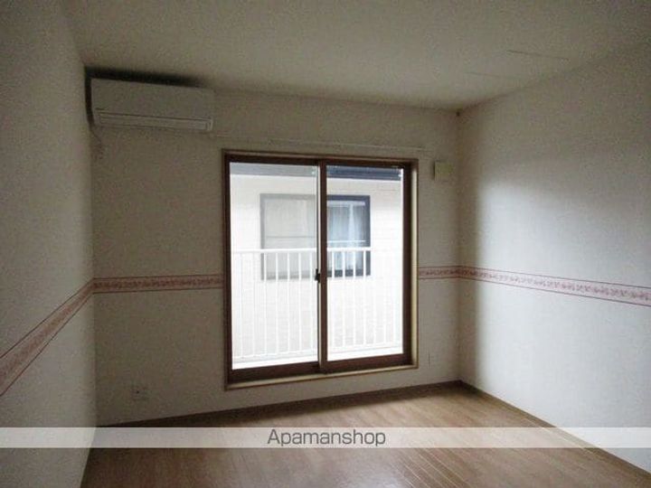 フローエスAUNⅡ203の居間