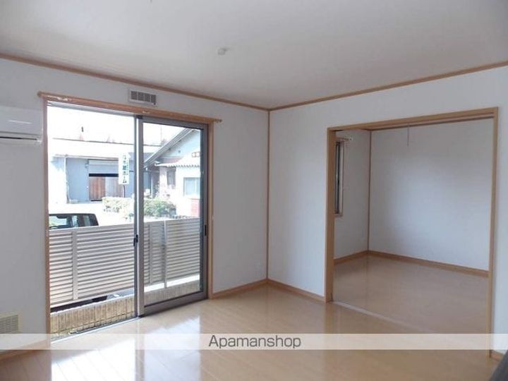 サンシャインクロノス102号室の居間