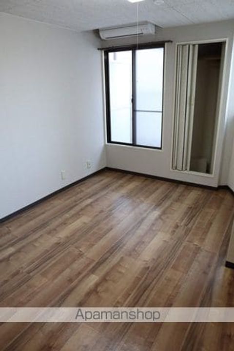 大阪府大阪市住吉区長居西2丁目の賃貸マンションの居間